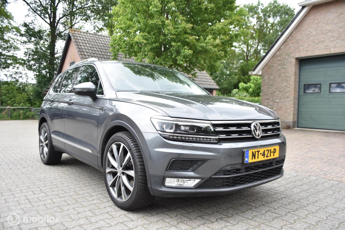 Volkswagen Tiguan - 1.4 TSI ACT Comfortline Business R 1.4 TSI ACT Comfortline Business R 1e eign - AutoWereld.nl