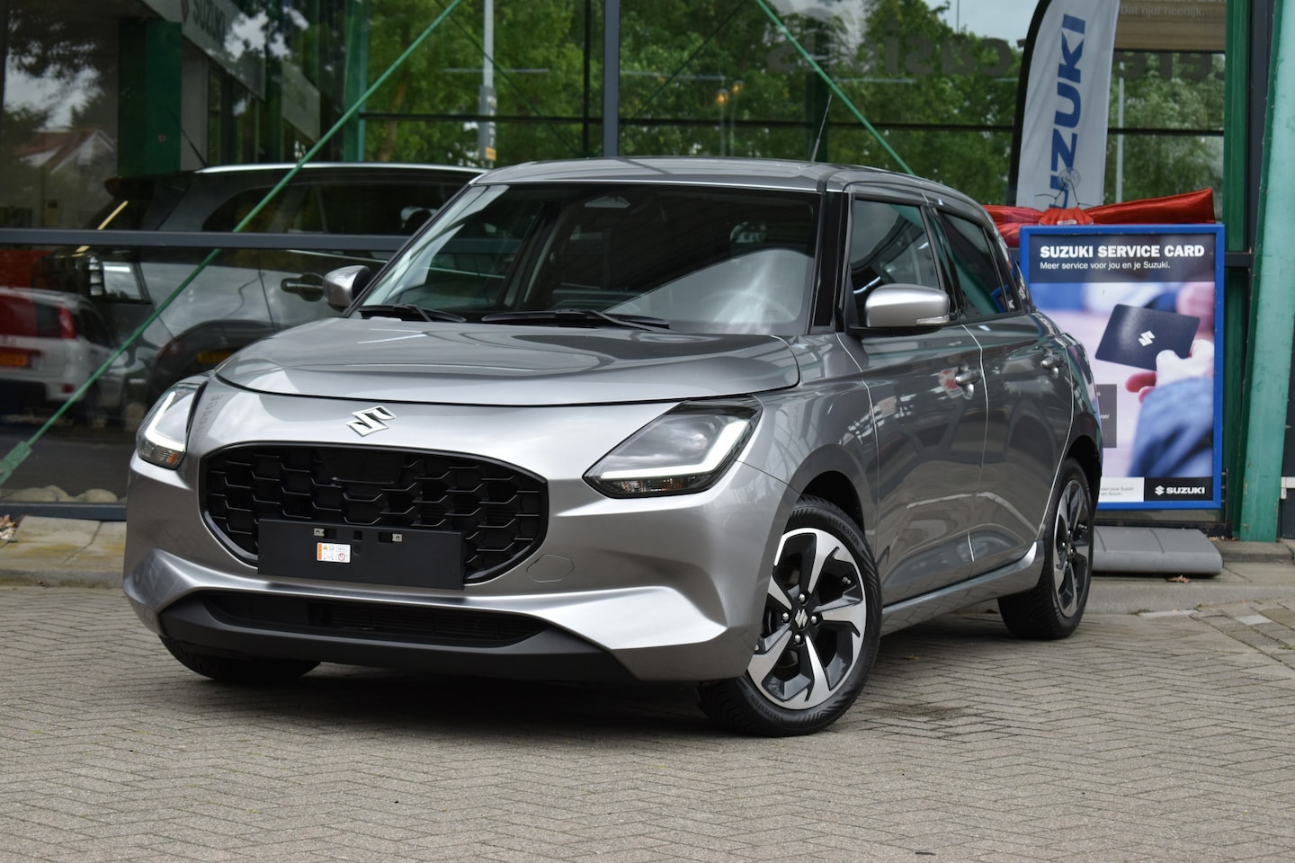 Suzuki Swift - 1.2 Style Smart Hybrid | Apple Carplay/Android Auto | Achteruitrijcamera | Climate control - AutoWereld.nl