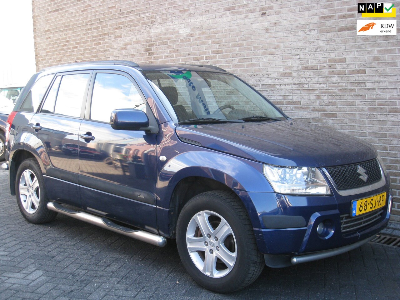 Suzuki Grand Vitara - 2.0-16V Exclusive - 4x4 - Sidebars - Trekhaak - - AutoWereld.nl