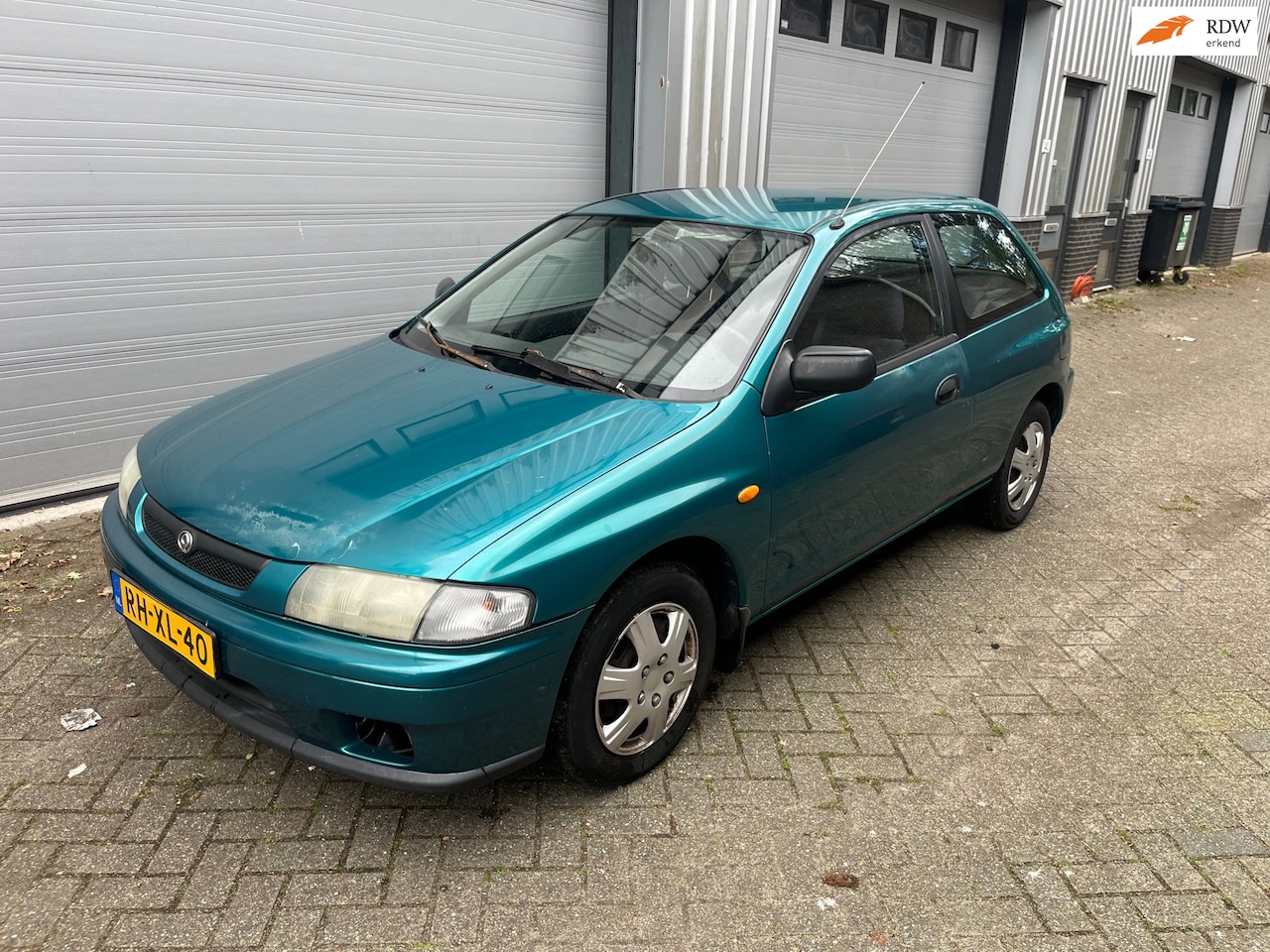 Mazda 323 - 1.5i P GLX! AIRCO! AUTOMAAT! 177 DKM NAP! - AutoWereld.nl