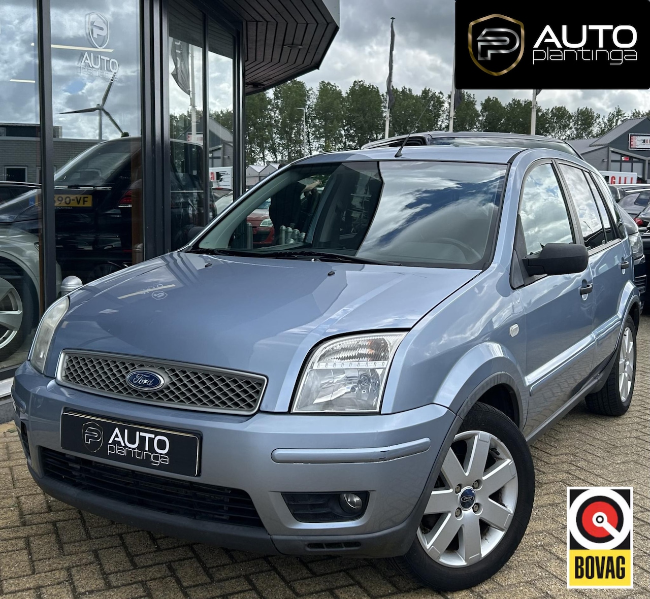 Ford Fusion - 1.4-16V Futura 79PK | Lage KM STAND | NL AUTO | Hoge instap | Airco | 2 Sleutels | Lederen - AutoWereld.nl