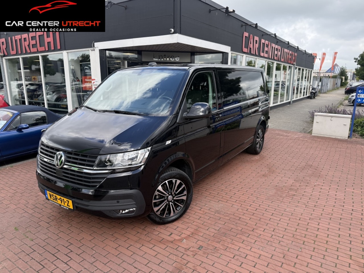 Volkswagen Transporter - 2.0 TDI L2H3 28 Bulli automaat airco navi trekhaak - AutoWereld.nl