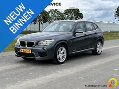 BMW X1 - sDrive20i High Executive Clima, cruise, stoelverwarming, pdc, trekhaak