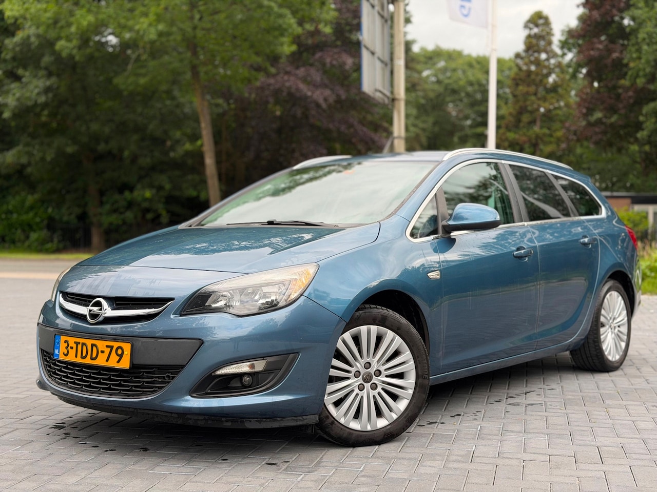 Opel Astra Sports Tourer - 1.4 Turbo LPG Design Edition/Cruise/PDC/Airco/Trekhaak - AutoWereld.nl