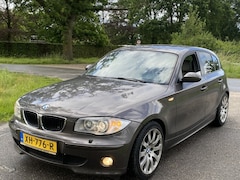 BMW 1-serie - leer stoelverwar 118i 2.0i Executive