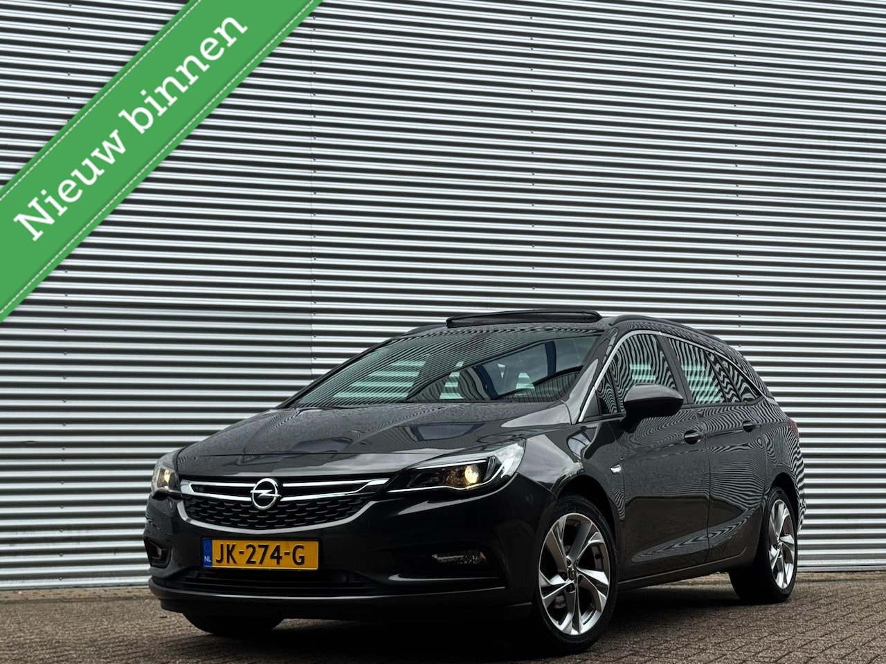 Opel Astra Sports Tourer - 1.0 Business/Panodak/Led/Trekhaak - AutoWereld.nl