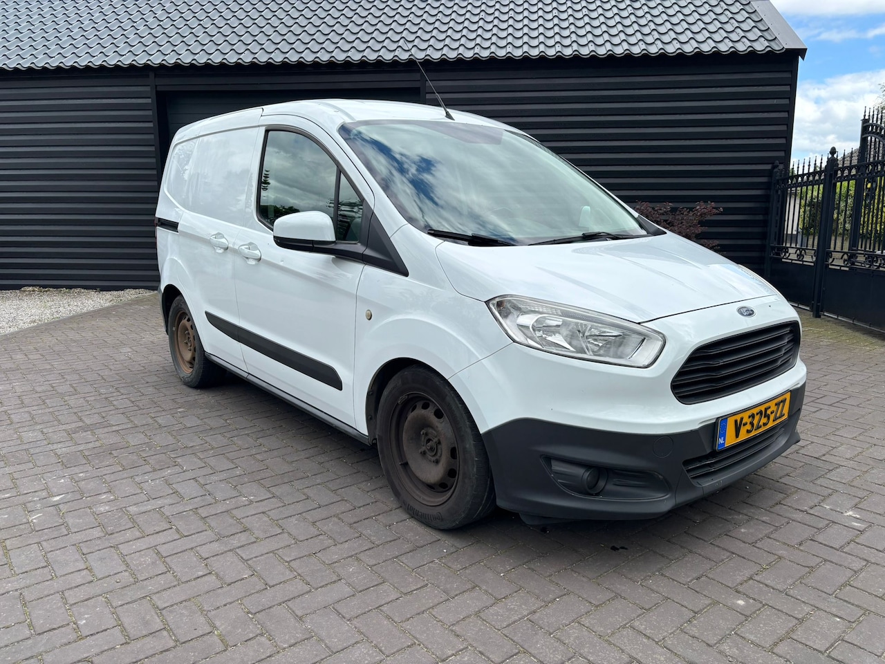 Ford Transit Courier - 1.5 TDCI Trend Start&Stop Airco Stoelverwarming - AutoWereld.nl