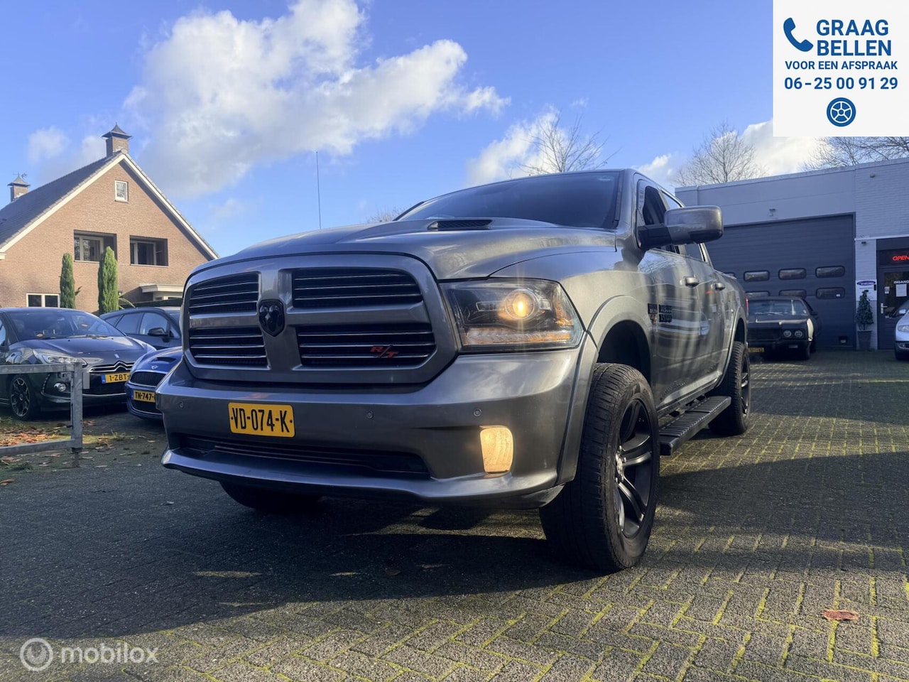 Dodge Ram 1500 - 5.7 V8 4x4 Crew Cab 5'7 Sport 3 inch verhoogd | Zeer goed onderhouden - AutoWereld.nl