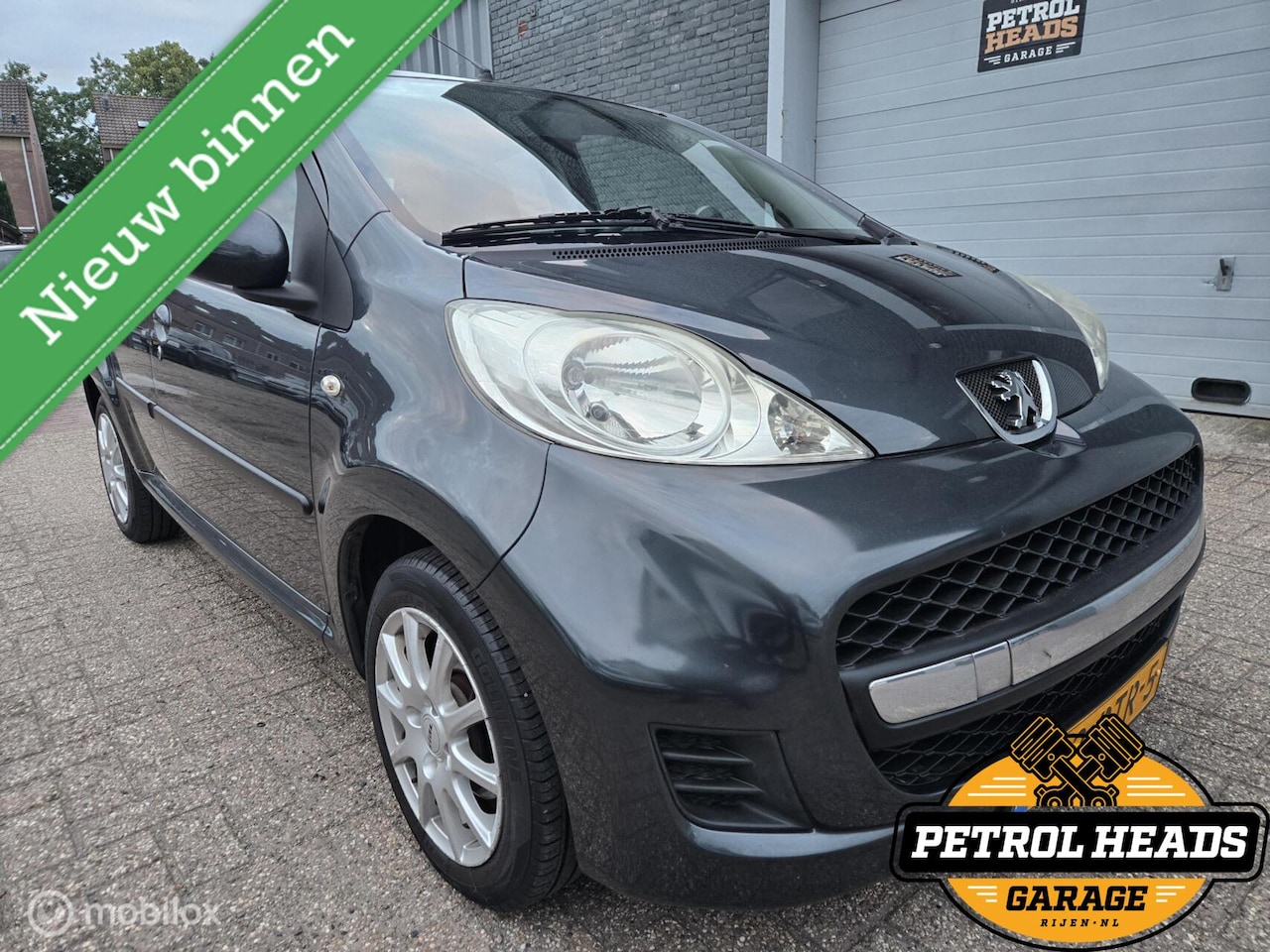Peugeot 107 - 1.0-12V Sportium 5D | NAP | Airco | LM velg - AutoWereld.nl