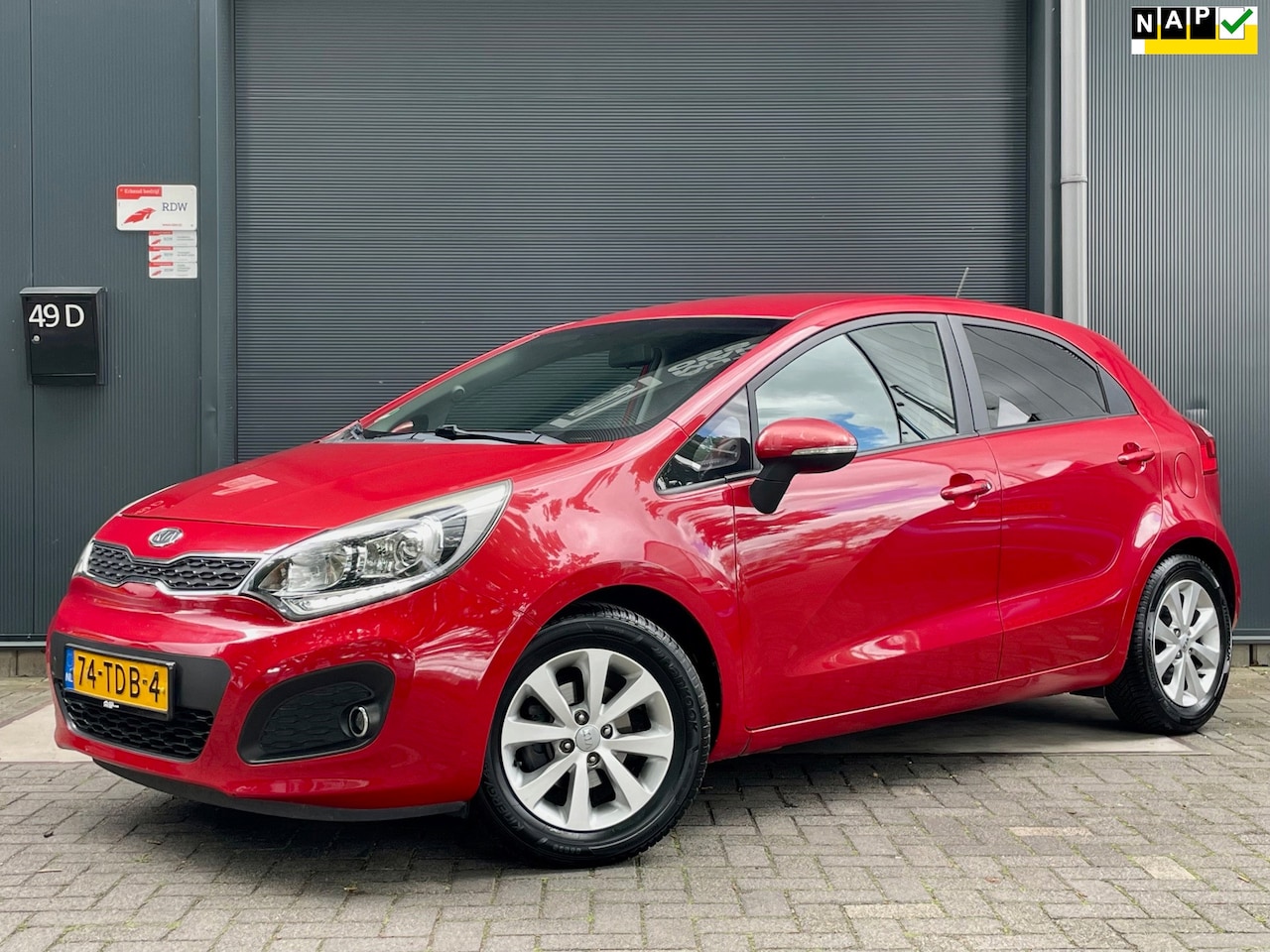 Kia Rio - 1.2 CVVT Super Pack NAP CAMERA CRUISE KEYLESS CLIMA BLUETOOTH PDC MF STUUR LM VELGEN LED T - AutoWereld.nl