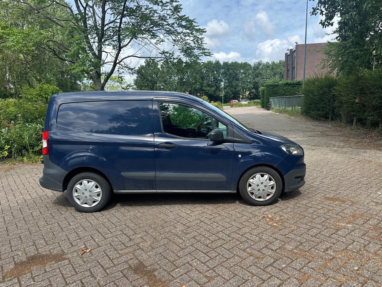 Ford Transit Courier - 1.5 TDCI Airco Blue Edition NW APK - AutoWereld.nl