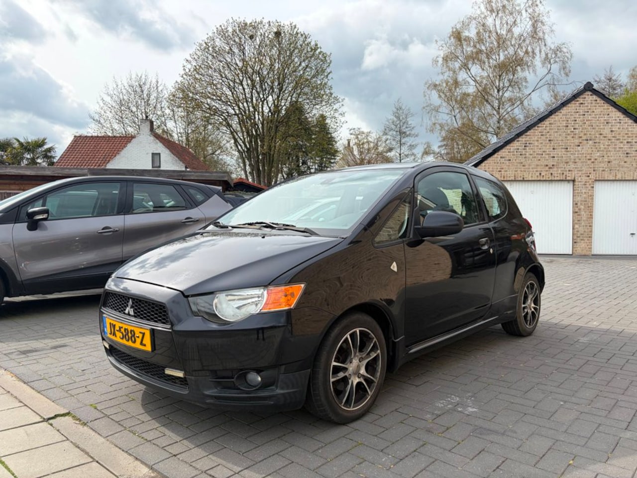 Mitsubishi Colt - 1.1 Inbusiness Airco - AutoWereld.nl