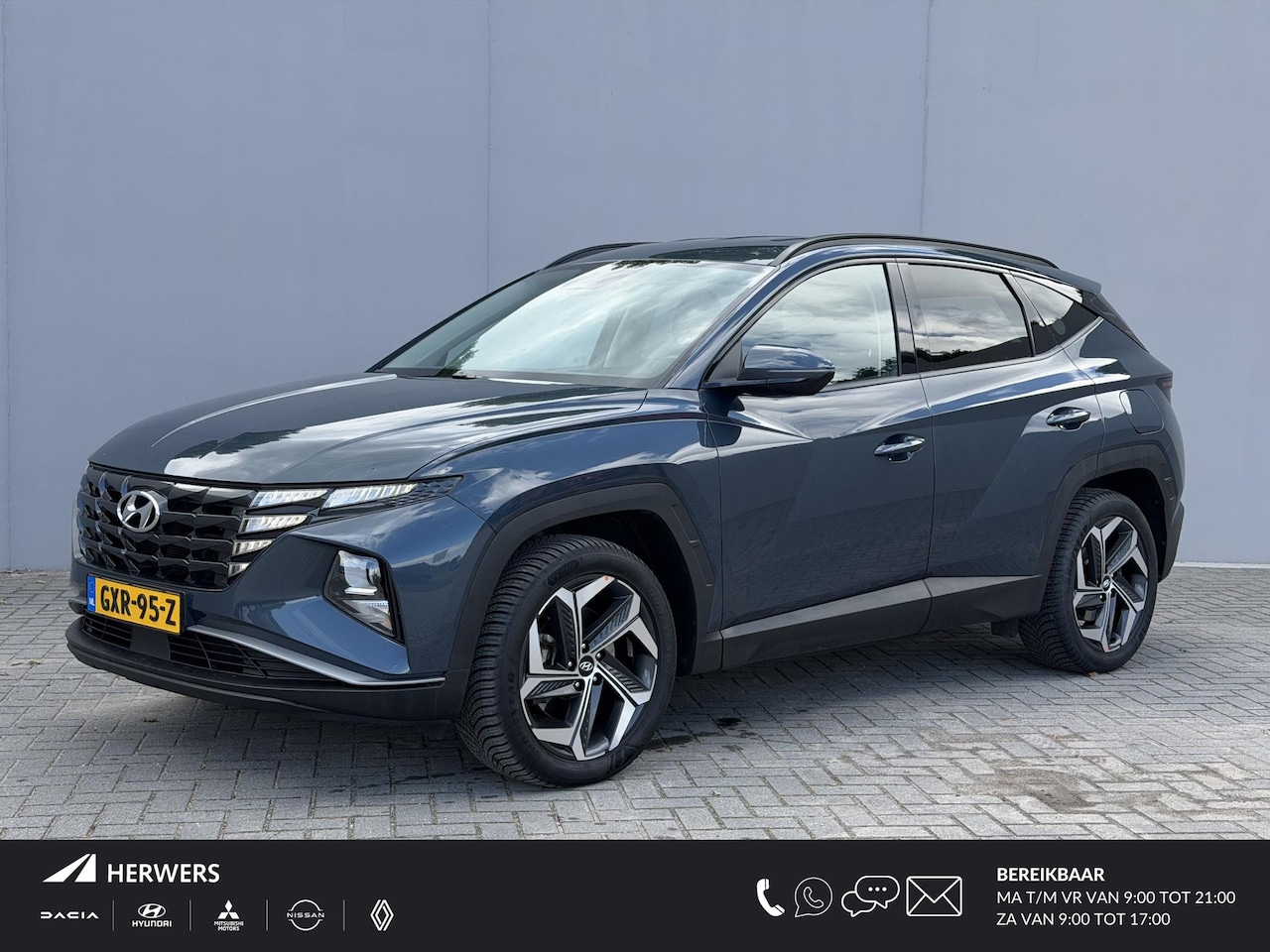 Hyundai Tucson - 1.6 T-GDI PHEV Comfort Smart 4WD / Dealer Onderhouden / Fabrieksgarantie tot 9-2028 / Navi - AutoWereld.nl