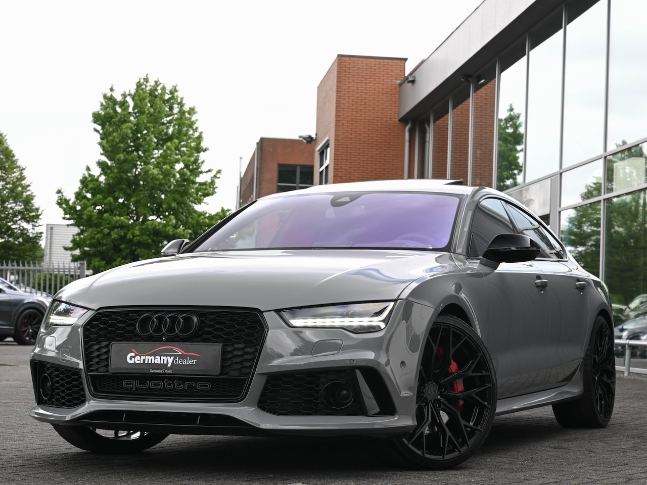 Audi RS7 - Sportback 4.0TFSI 560pk Quattro Pano Milltek B&O High-End RS-Zetels Carbon Sport-uitlaat N - AutoWereld.nl