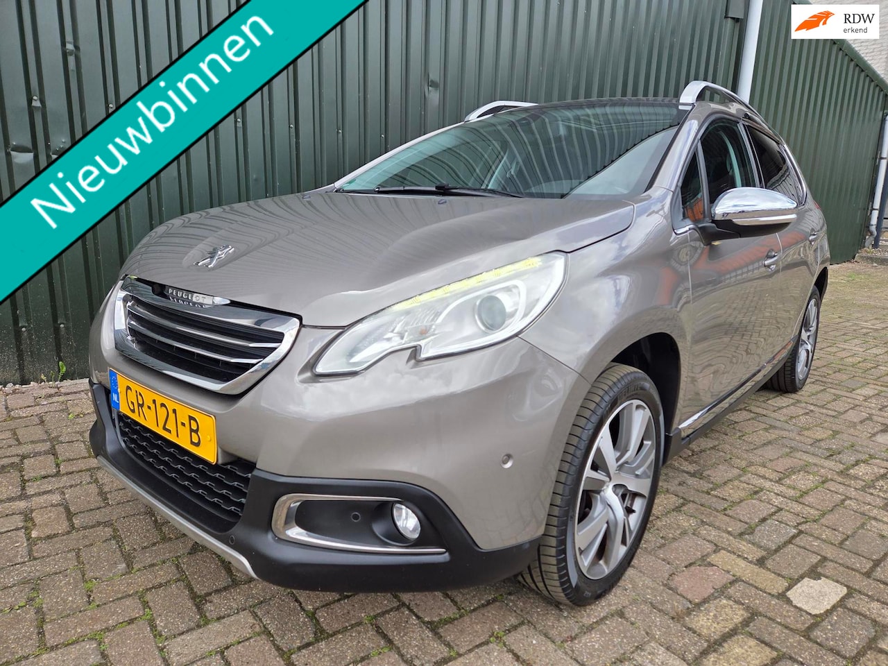 Peugeot 2008 - 1.6 VTi Allure panoramadak - AutoWereld.nl