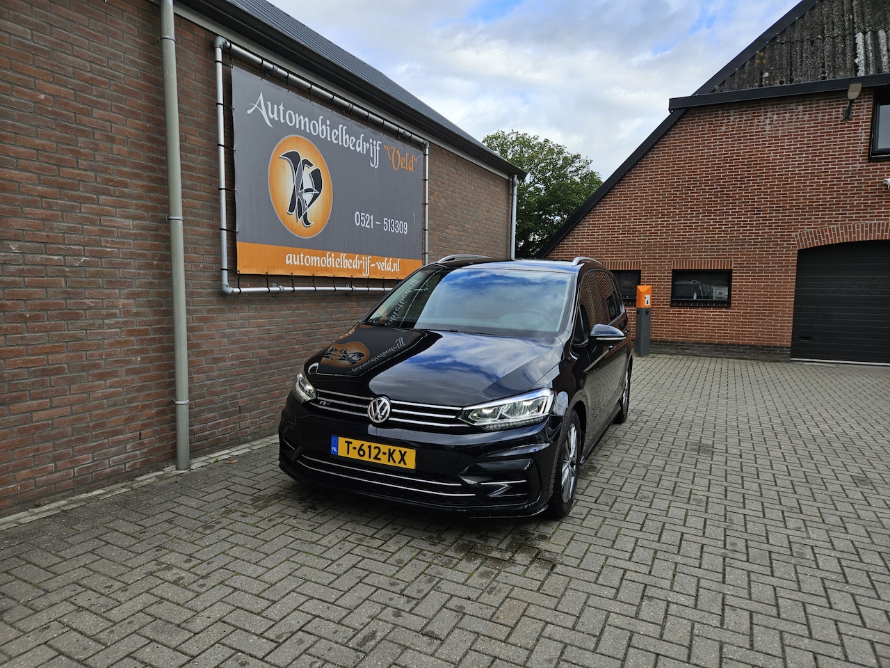Volkswagen Touran - 1.4 TSI Highline R-line 7p - AutoWereld.nl
