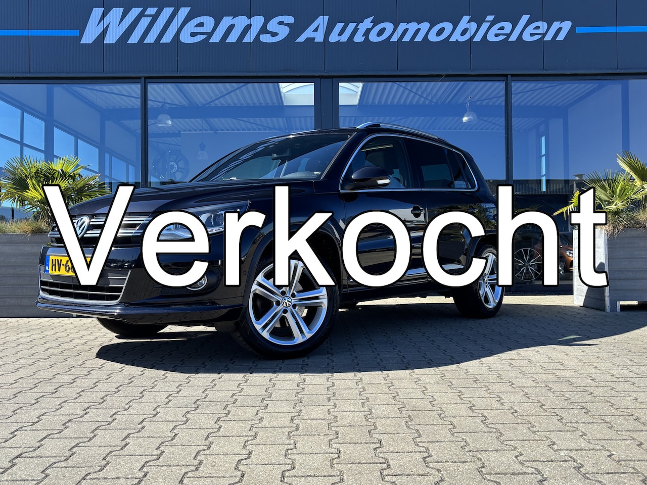 Volkswagen Tiguan - 1.4 TSI R-Line Edition Schuifkanteldak, App-Connect & Trekhaak Afneembaar - AutoWereld.nl