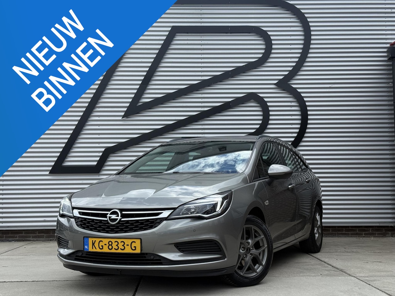 Opel Astra Sports Tourer - 1.4 Business+ 1e Eigenaar|Navi|Cruise|Trekhaak|Carplay|PDC V+A|Airco|Goed onderhouden|N.A. - AutoWereld.nl
