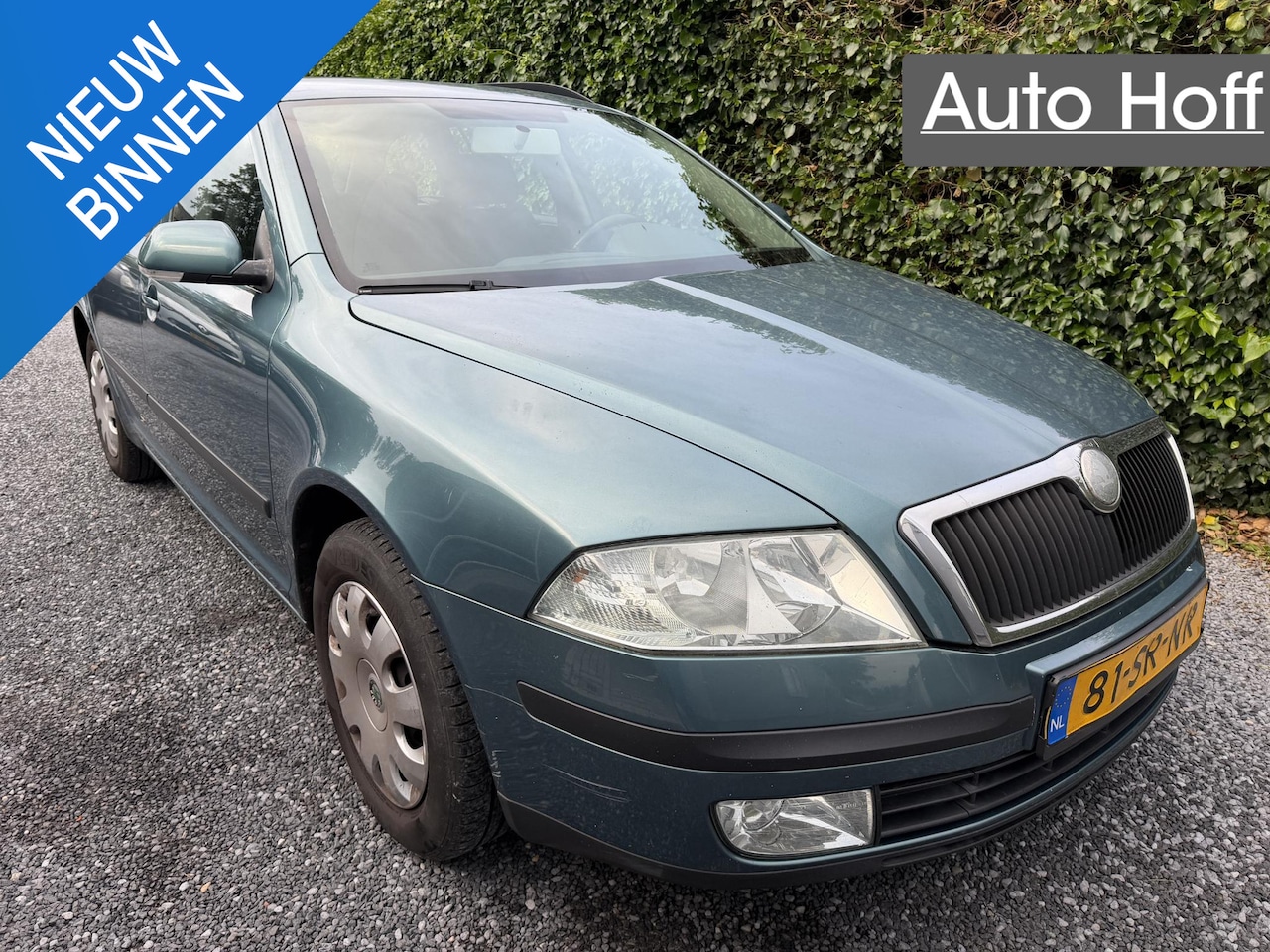 Skoda Octavia Combi - 1.6 FSI Ambiente | Airco | Cruise Control | Trekhaak | Elekt. Ramen | Radio / CD | APK tot - AutoWereld.nl