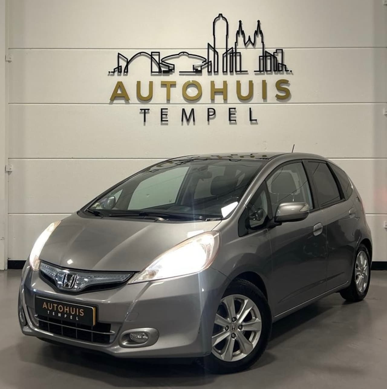 Honda Jazz - 1.4 Hybrid Exclusive Automaat Nap 1E Eigenaar Dealer Onderhouden Cruise Climate Leder Stoe - AutoWereld.nl