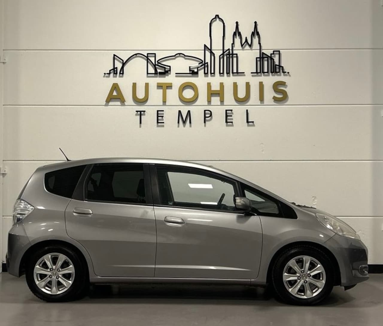 Honda Jazz - 1.4 Hybrid Exclusive Automaat Nap 1E Eigenaar Dealer Onderhouden Cruise Climate Leder Stoe - AutoWereld.nl