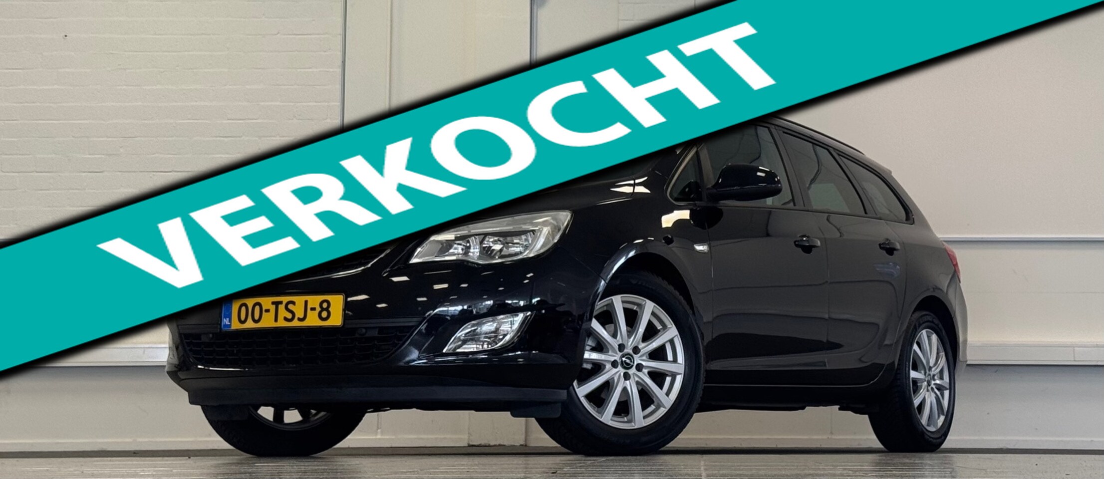 Opel Astra Sports Tourer - 1.4 Turbo Edition Navigatie CruiseControl Allseason Mooi! - AutoWereld.nl