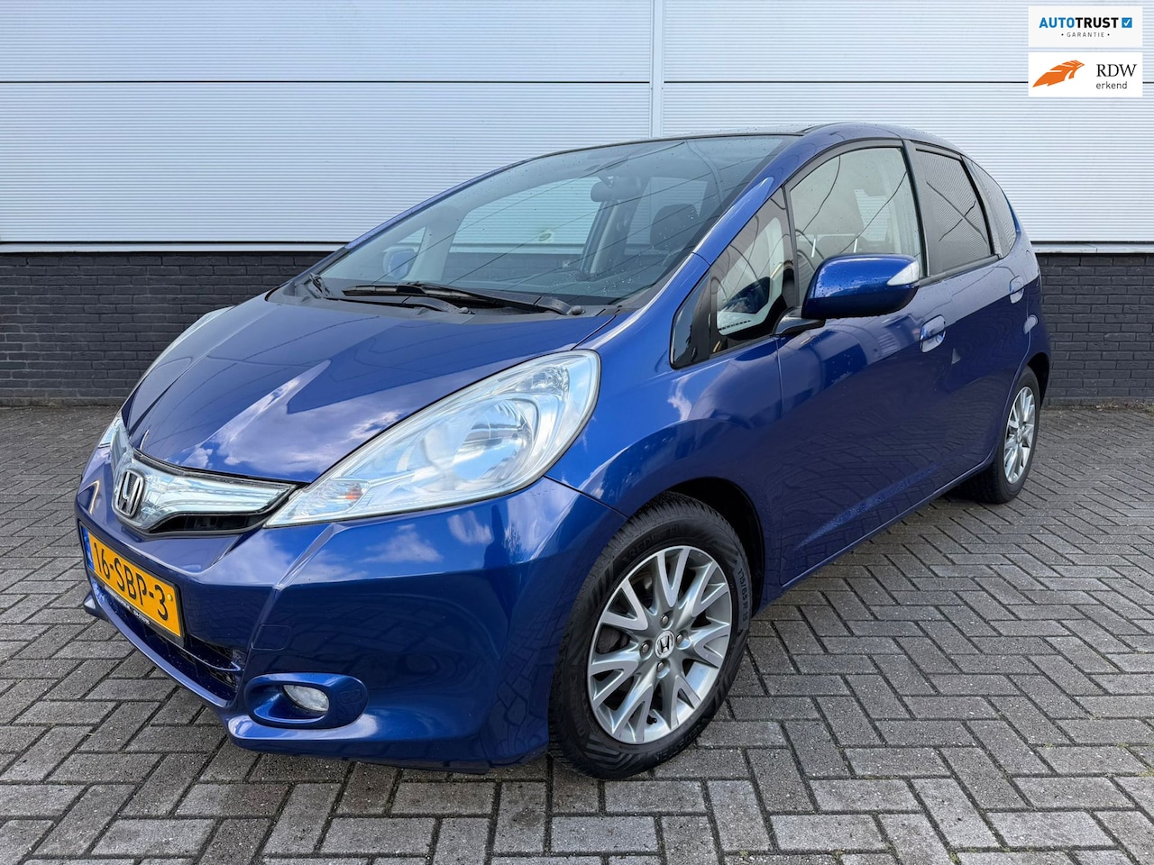 Honda Jazz - 1.4 Hybrid Elegance 5-drs Clima - panorama - Lm velgen - 1e eigenaar - goed onderhouden - AutoWereld.nl