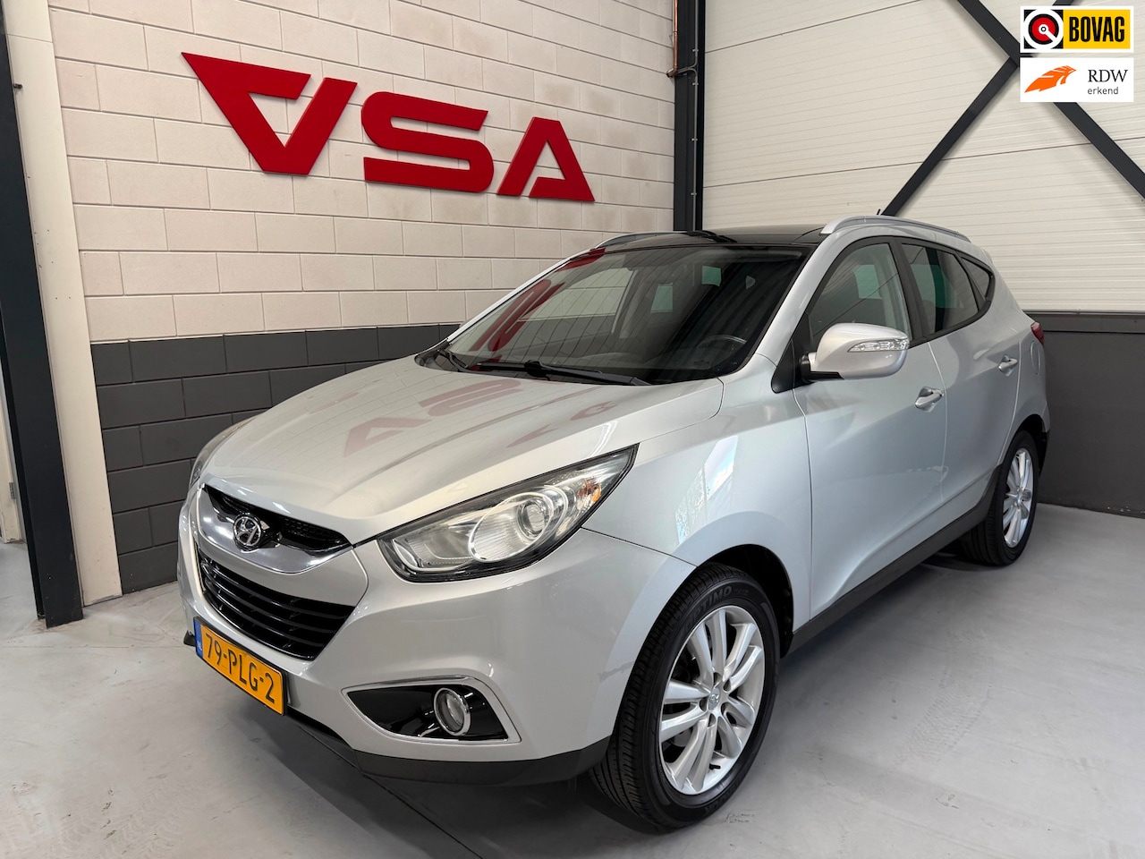 Hyundai ix35 - 2.0i i-Catcher|Pano|Cruise|Trekhaak|Camera|Stoelvw|Climate|Navi|leer|1 eigenaar|key-less|a - AutoWereld.nl