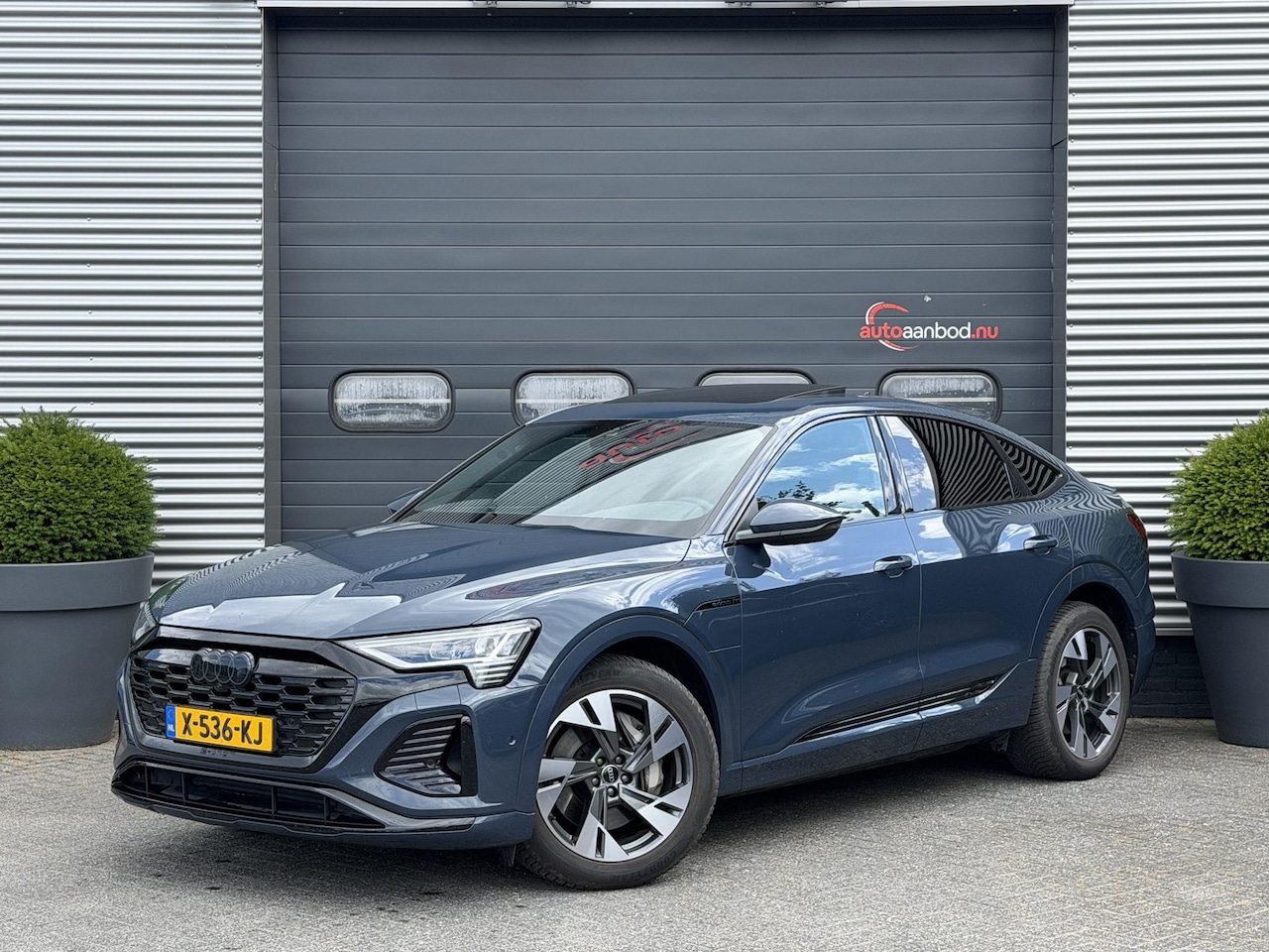 Audi Q8 Sportback e-tron - 55 quattro S Edition Competition 115 kWh | Panoramadak | Luchtvering | Camera | Bang & Olu - AutoWereld.nl