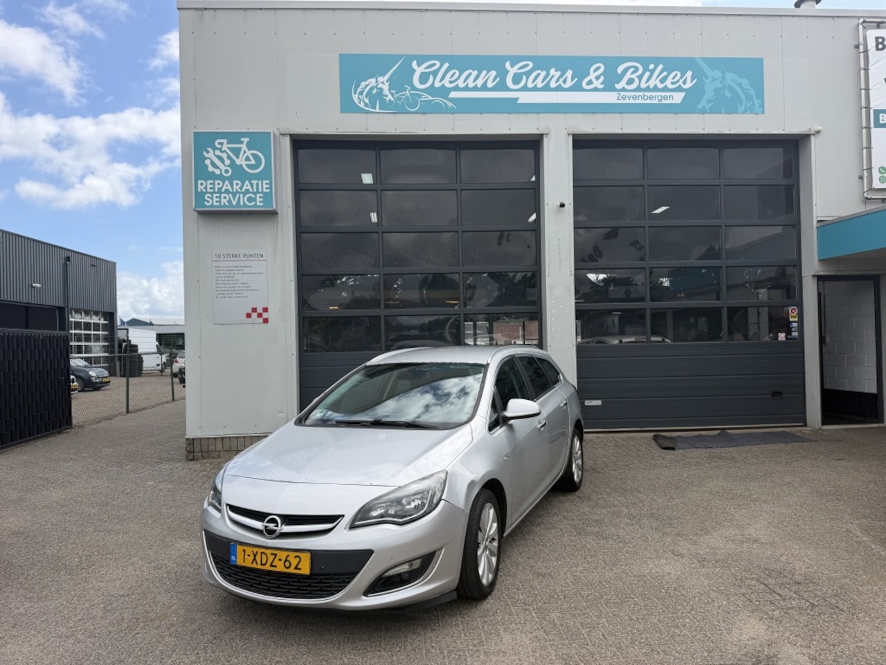 Opel Astra Sports Tourer - 1.4 Turbo Sport 1.4 Turbo Sport - AutoWereld.nl