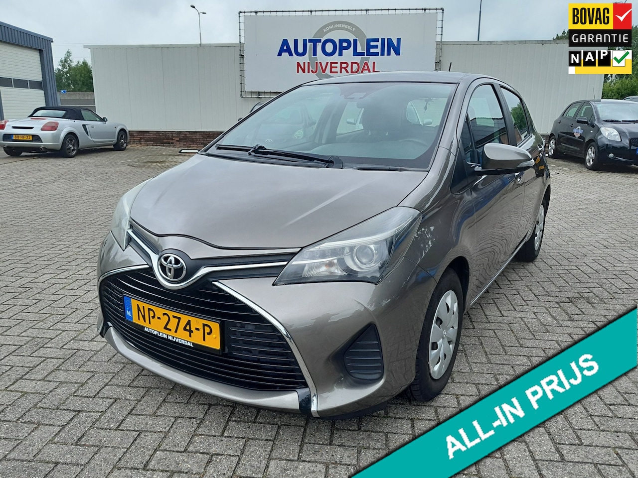 Toyota Yaris - 1.0 VVT-i Trend In nederland nieuw geleverde goed onderhouden auto met navigatie,achteruit - AutoWereld.nl