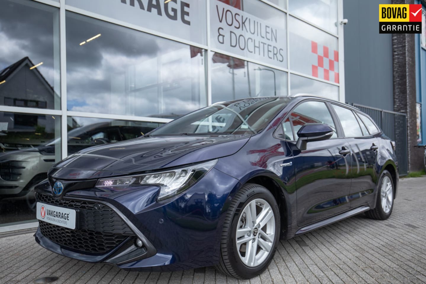 Toyota Corolla Touring Sports - 1.8 Hybrid Business Plus Dodehoeksensoren - AutoWereld.nl