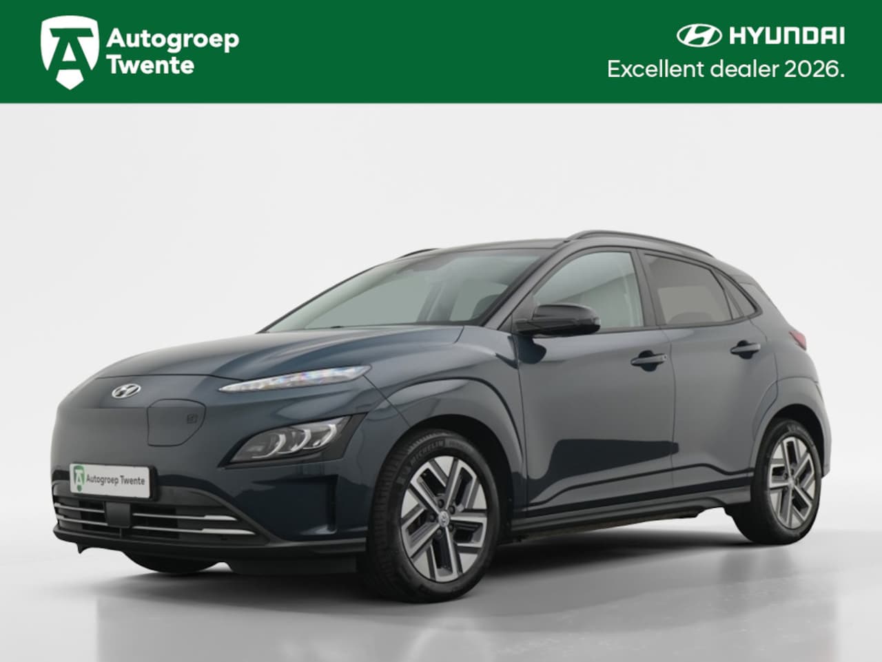 Hyundai Kona Electric - EV Premium 64 kWh | Wit leder | Navigatie | Camera | Stoelventil - AutoWereld.nl