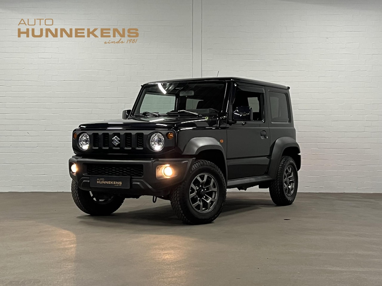 Suzuki Jimny - 1.5 Stijl *4 persoons* Cruise control | Stoelverwarming | Achteruitrij camera | Airco | Ca - AutoWereld.nl