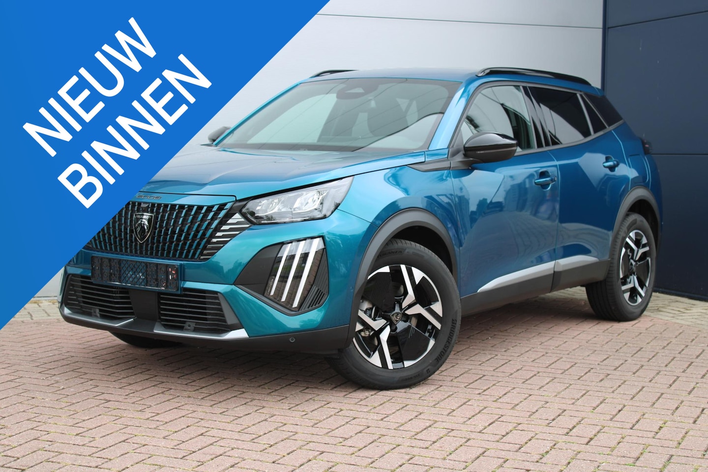 Peugeot 2008 - 1.2 Hybrid 136 Style NAVIGATIE - PARKEERHULP & CAMERA VOOR/ACHTER - ADAPTIEVE CRUISE CONTR - AutoWereld.nl