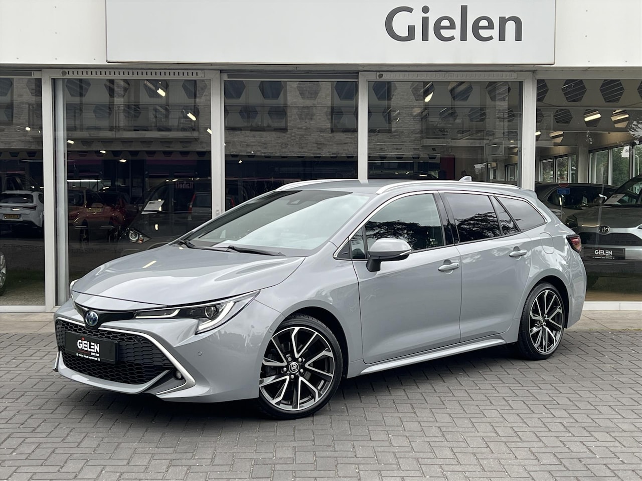 Toyota Corolla Touring Sports - 2.0 Hybrid Executive JBL 2.0 Hybrid 184pk Executive | JBL, HUD, Stoel + stuurverwarming, Elektrische achterklep - AutoWereld.nl