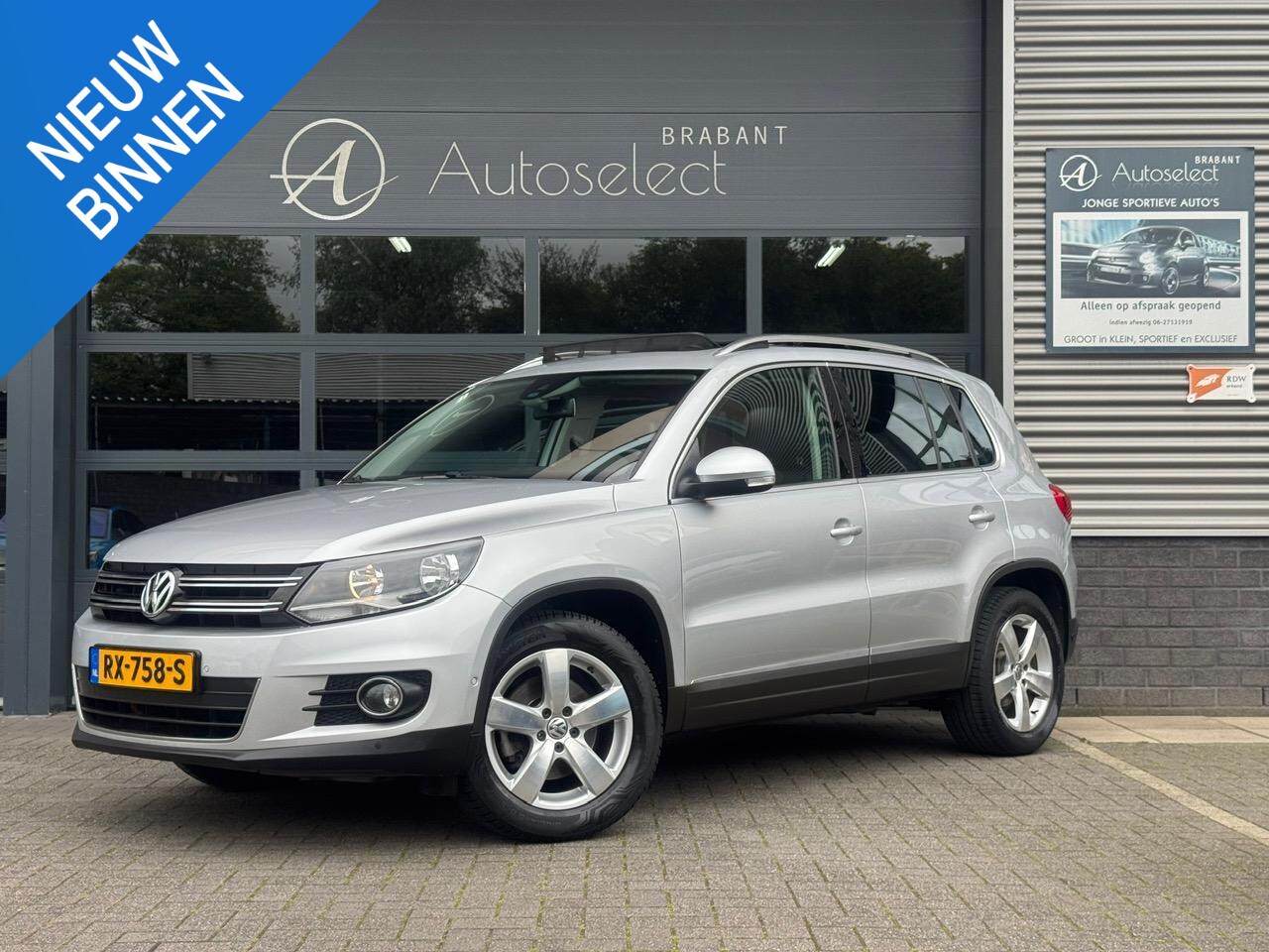 Volkswagen Tiguan - 1.4 TSI Style Clima Leder Panorama Camera - AutoWereld.nl