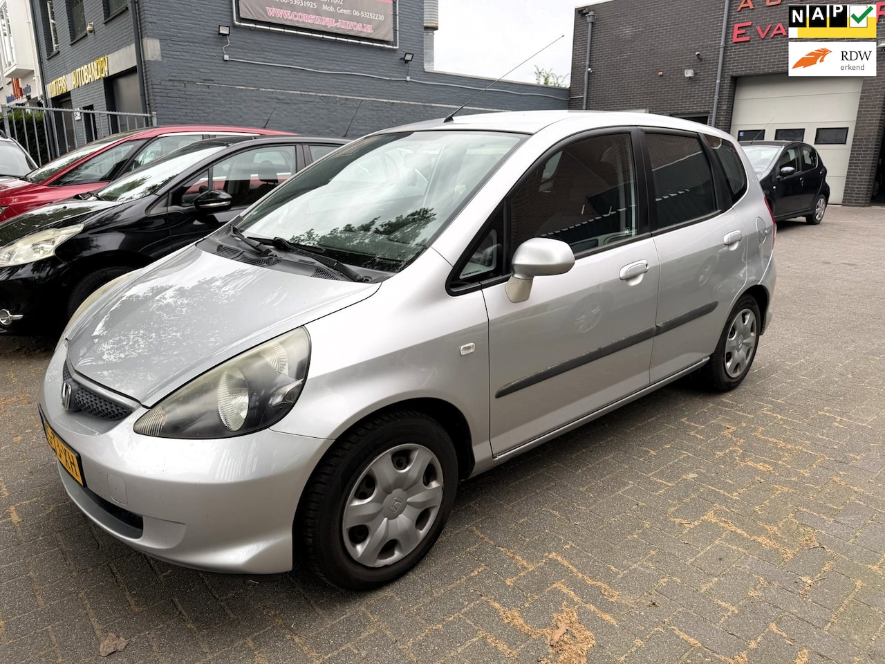 Honda Jazz - 1.2 Cool Airco. geluid in bak - AutoWereld.nl