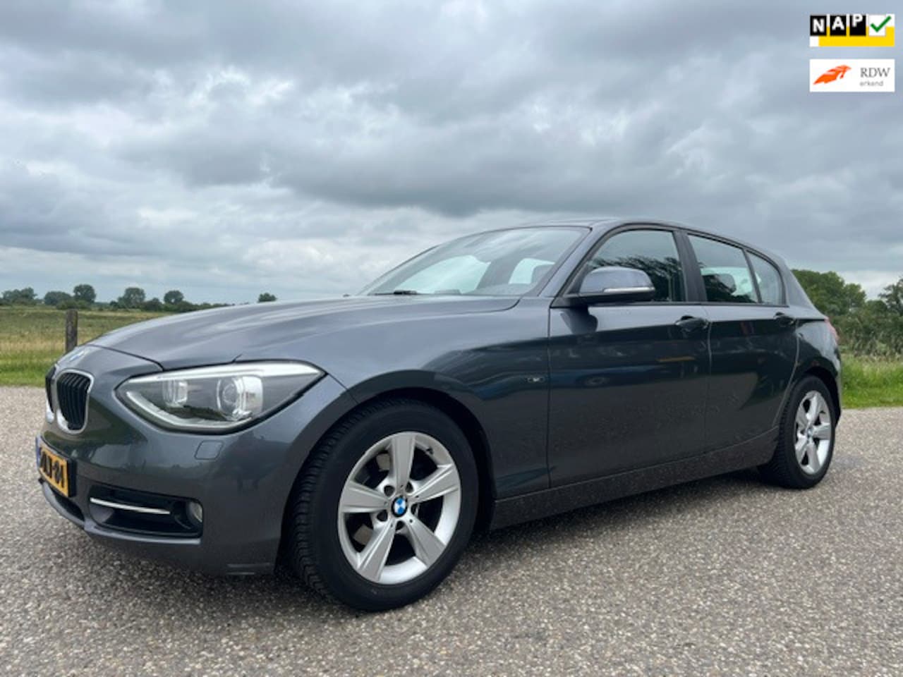 BMW 1-serie - 114i EDE Corporate Lease Edition clima.navi.147529 km nap bj 2014 - AutoWereld.nl