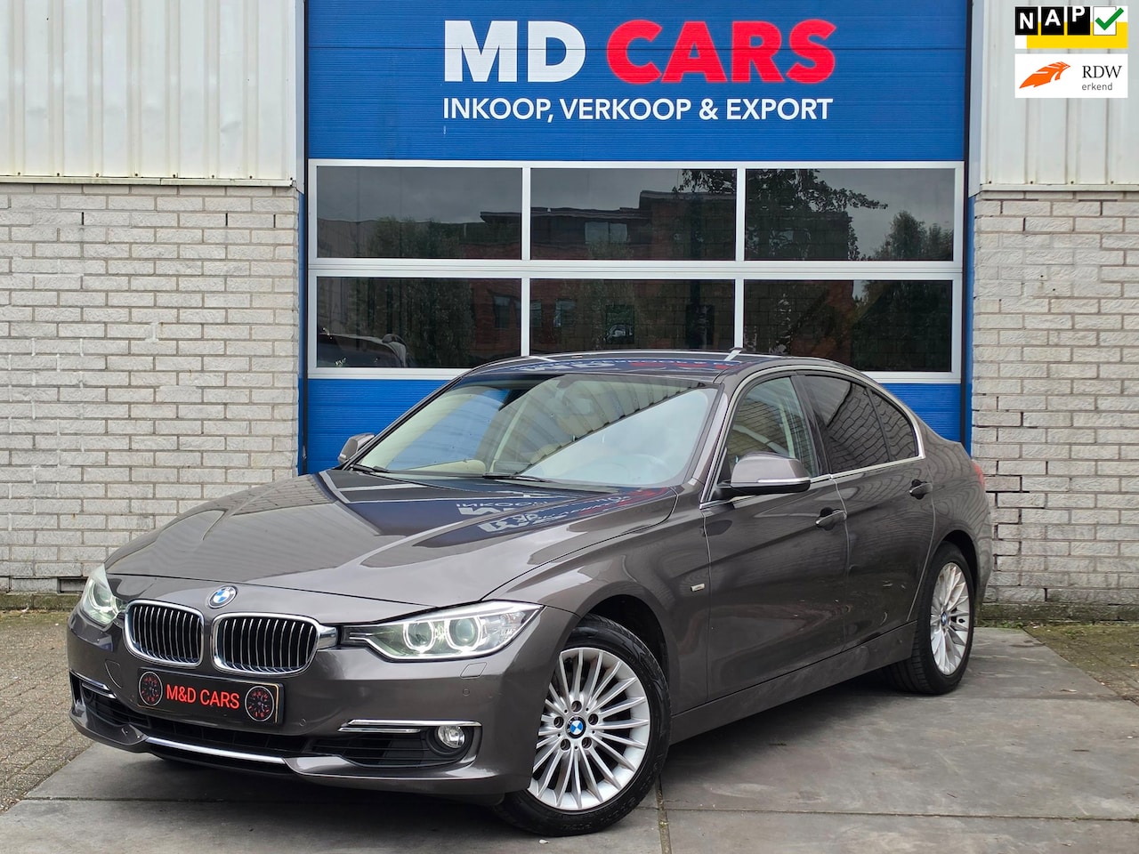 BMW 3-serie - 320i Upgrade Edition AIRCO/CR CONTROL/NAVI/LEER - AutoWereld.nl
