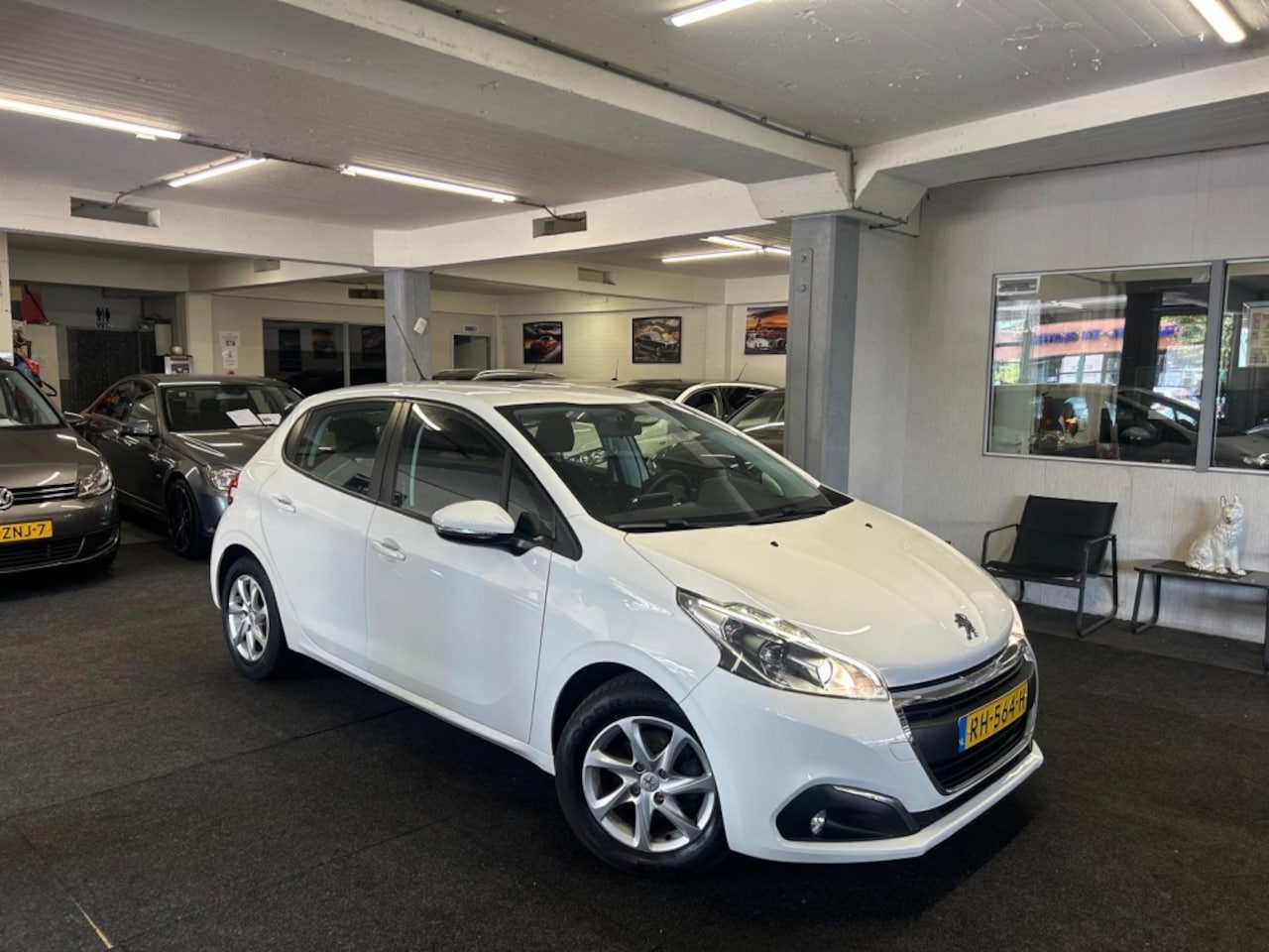 Peugeot 208 - 1.2 Blue Lion*NAP*Carplay*Velgen - AutoWereld.nl