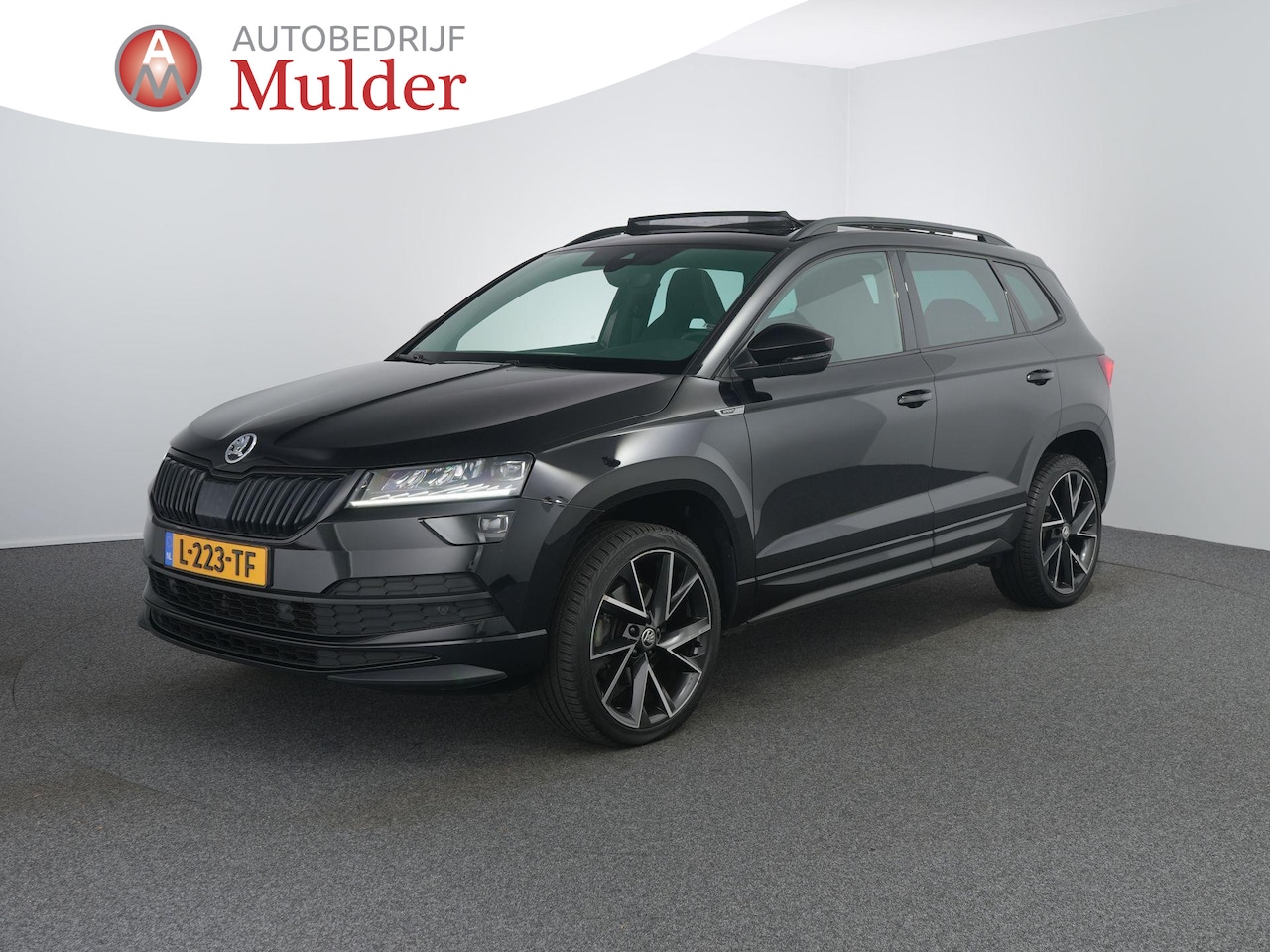 Skoda Karoq - 1.5 TSI ACT Sportline Business | Pano | Zwenkhaak | Winterpakket | Camera | ACC | - AutoWereld.nl