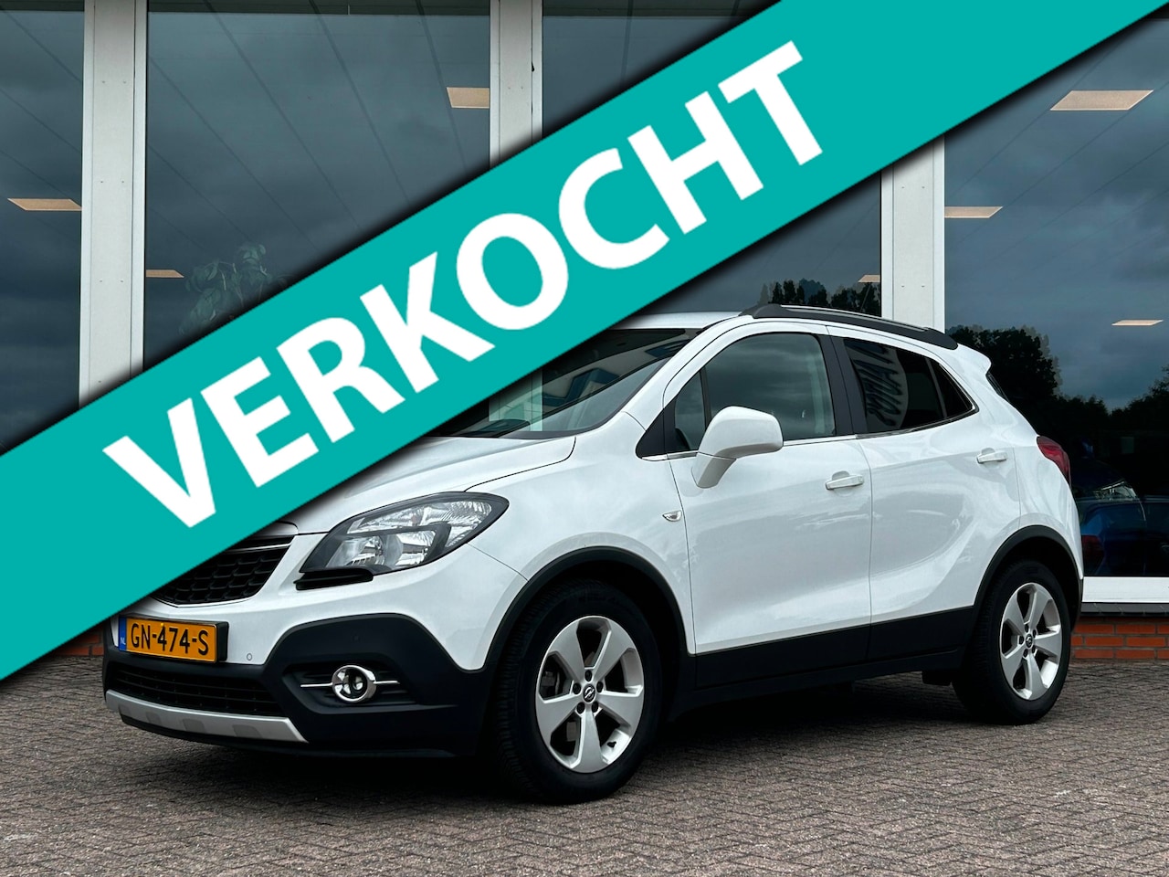 Opel Mokka - 1.4 T Cosmo - Origineel NL - NAP - Navi - PDC - Camera - Trekhaak - AutoWereld.nl