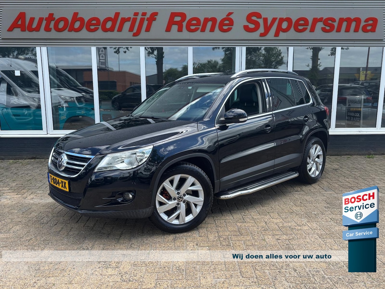 Volkswagen Tiguan - 2.0 TSI Sport&Style 4Motion | Trekhaak | Pano | 4 Motion | Automaat | Stoelverwarming | Le - AutoWereld.nl