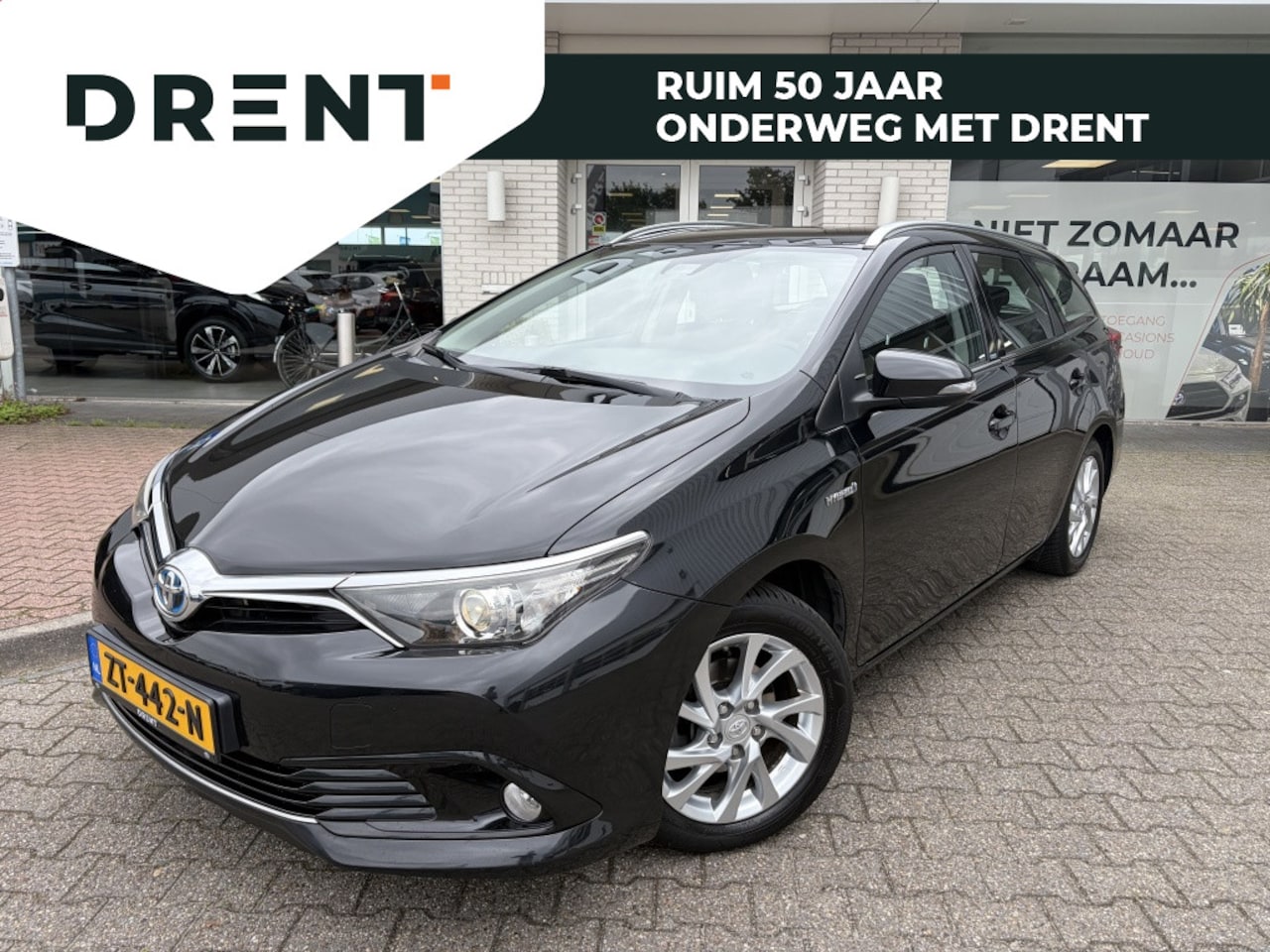 Toyota Auris Touring Sports - 1.8 Hybrid Dynamic Go | Trekhaak | All-season | Stoelverw - AutoWereld.nl