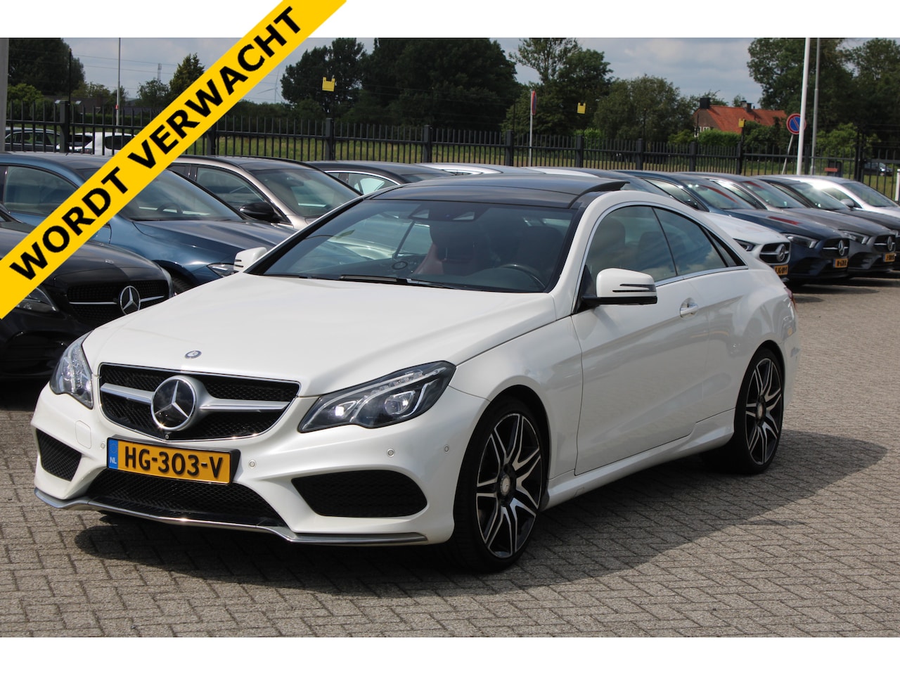 Mercedes-Benz E-klasse Coupé - 320 Prestige AMG PANORAMADAK LEDER MEMORY DISTRONIC 360-CAMERA H&K 19'' - AutoWereld.nl