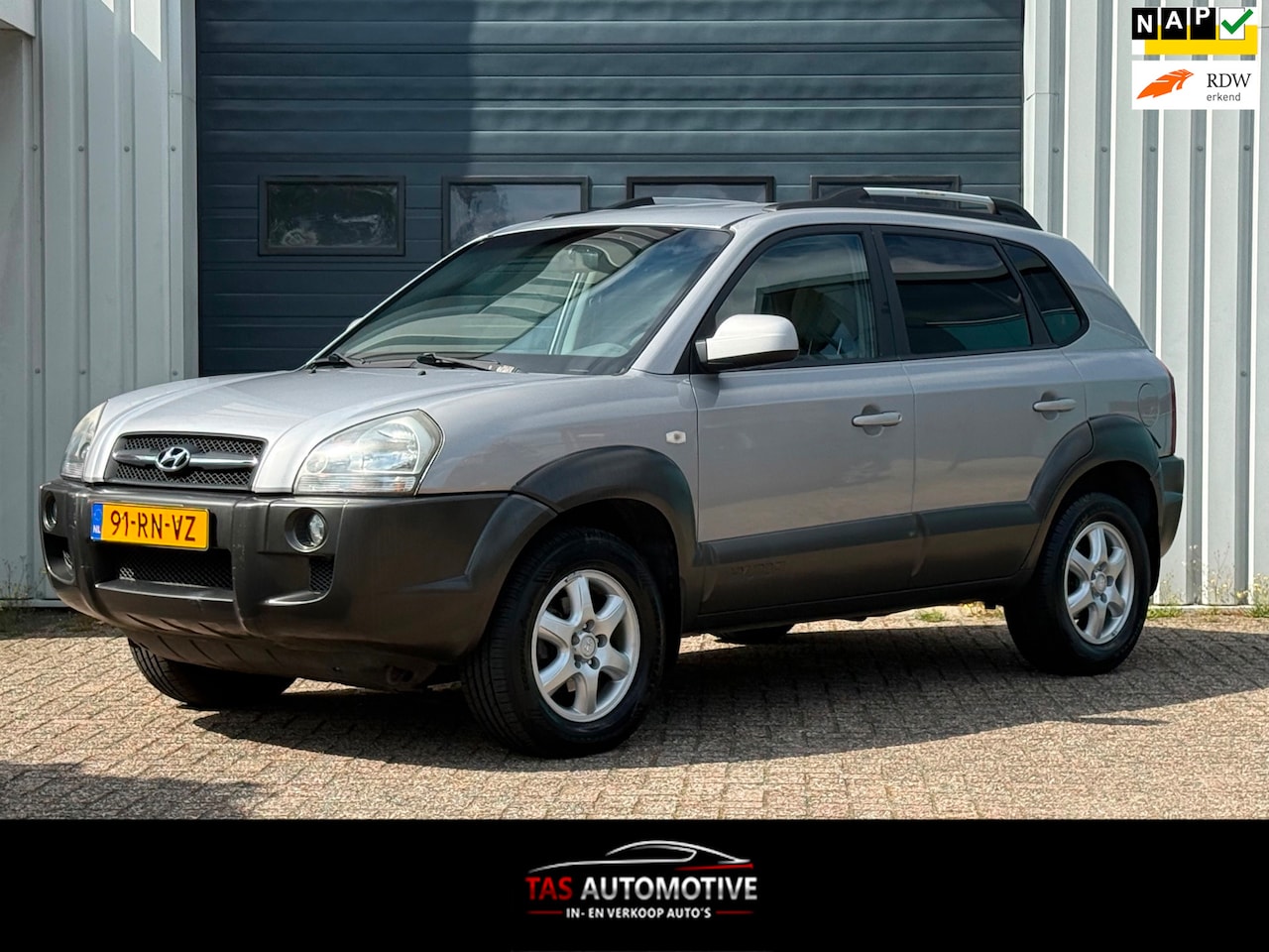 Hyundai Tucson - 2.0i Dynamic AIRCO / 115.781 KM / NAP - AutoWereld.nl