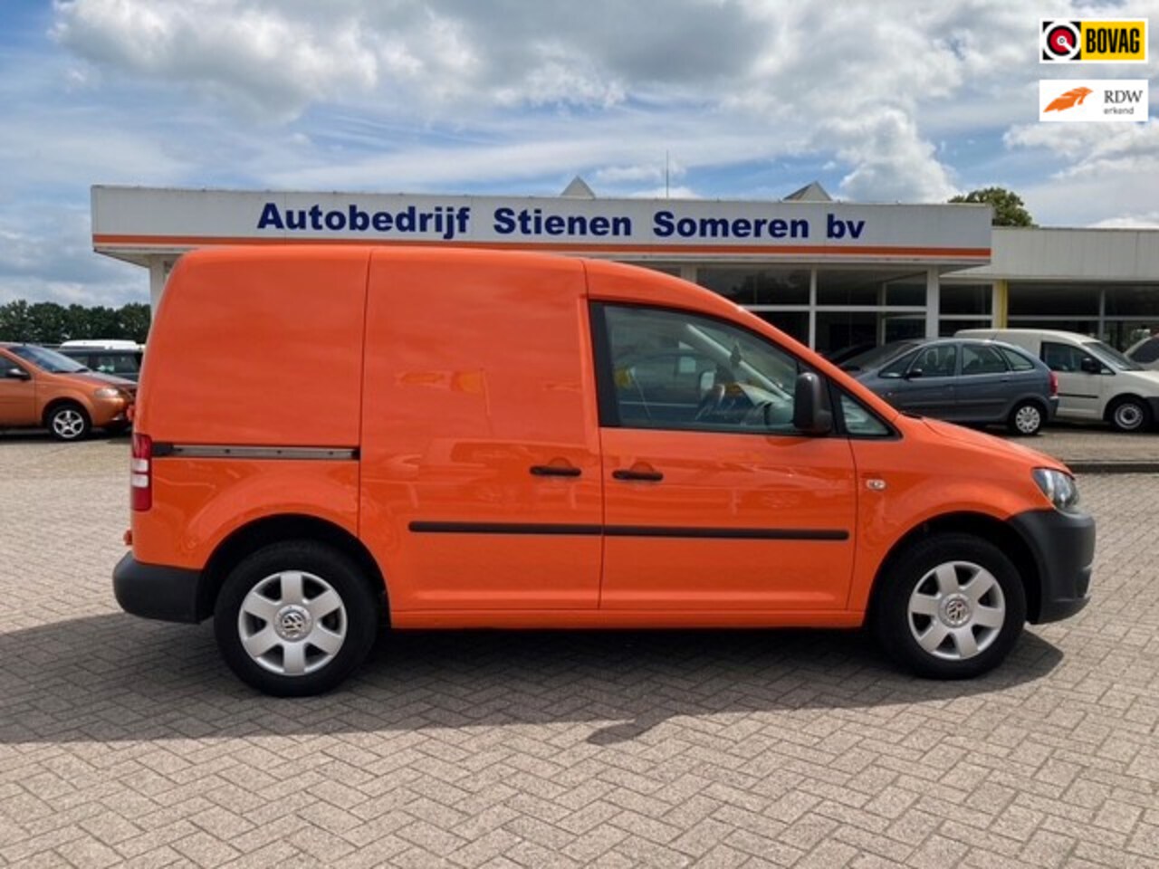 Volkswagen Caddy - 1.6 TDI Oranje HUP HUP Nederland - AutoWereld.nl