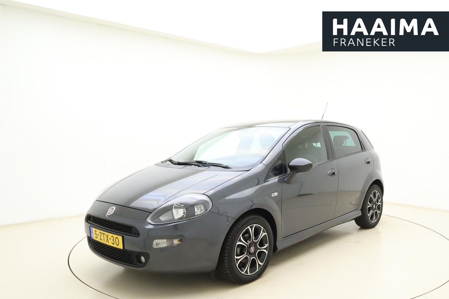 Fiat Punto Evo - 0.9 TwinAir Racing 5 Deurs | Airco | Parkeerhulp achter | Lichtmetalen Velgen | Bluetooth - AutoWereld.nl