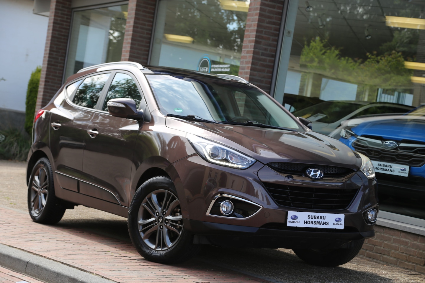 Hyundai ix35 - 1.6i GDI i-Vision Schuifdak Navi Camera - AutoWereld.nl